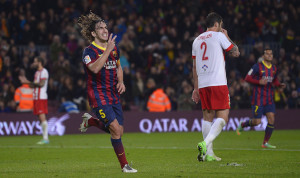 FC Barcelona 39 s Carles Puyol reacts after scoring against Almeria