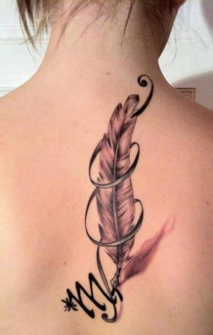 Grey color feather tattoo
