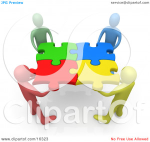 Team Of Diverse People Holding Up Connected Pieces To A Colorful ...