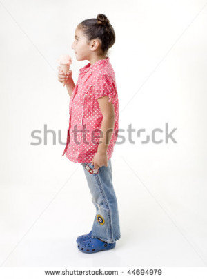 Profile Of A Little Girl Eating Strawberry Ice Cream In A Cone ...