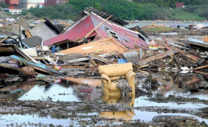 View of rubble after a tsunami in San Antonio, Valparaiso, Chile ...