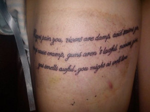 tattoo on my thigh. says 'razors pain you, rivers are damp, acid ...