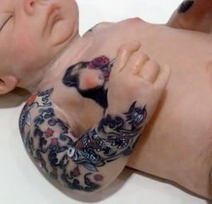 Drunk mother tattoos her 9 months old child.