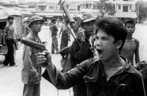 Khmer Rouge taking over Phnom Penh in 1975.