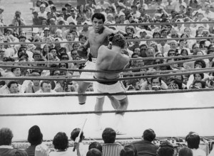 ... boxer Joe Bugner, in their title fight at the Merdeka Stadium in Kuala