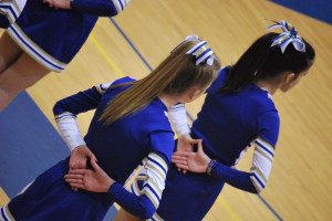 She cheered for 9th grade JV football (undefeated season) and ...