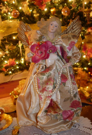 paid a dollar for this lovely angel. All year long I go to thrift ...