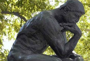 Thinker with a green background —