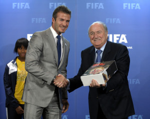 Pictures of David Beckham Handing Over the 2018 World Cup Bid For