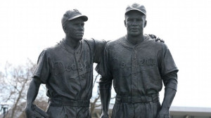 AP Photo/Kevin Reece This statue of Pee Wee Reese and Jackie Robinson ...
