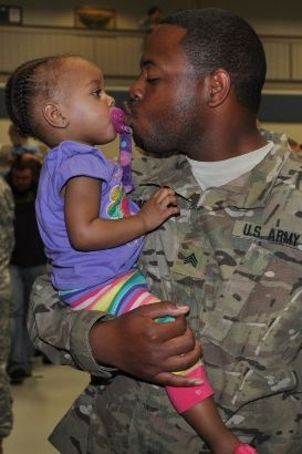 , Qadance, a kiss after the welcome home ceremony at Ike Skelton ...