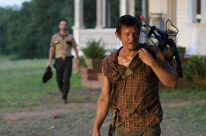 Background) Rick Grimes (Andrew Lincoln) and (Forground) Daryl Dixon ...