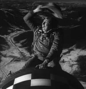 For those who didn't see the movie, he is riding an atomic bomb down.