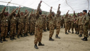 Pakistani soldiers shout 