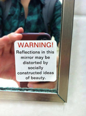 warning. reflection in this mirror..