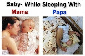 Baby while sleeping with mama papa