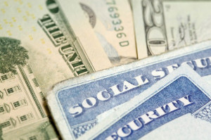 Social security cards lying on money