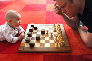 funny ceckmate baby playing chess vs adult