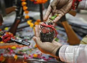Hand grenades and prayers in India during the Dussehra festival