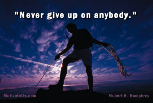 picture of man pulling rope for climber with the quote: Never give ...