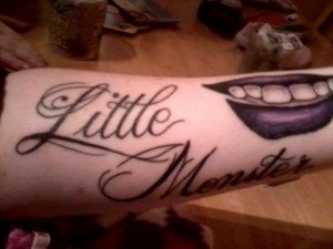 Little Monster Tattoo With A Smile