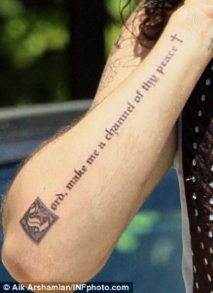 One step at a time: Reformed drug user Russell Brand debuts new tattoo ...