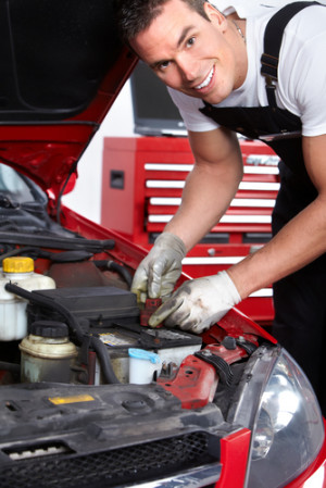 handsome_mechanic_working_in_auto_repair_shop_.jpg