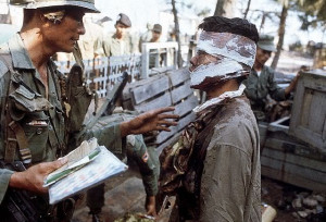 151- A bereaved South Vietnamese family watches as a grave is dug for ...
