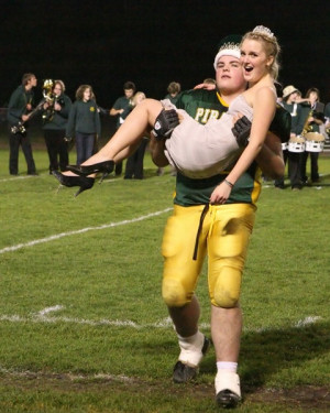 The football player carrying the homecoming queen - a classic and ...