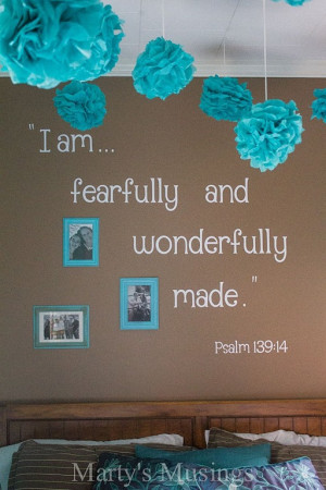 With a scripture verse on the wall and turquoise pompoms, what a ...