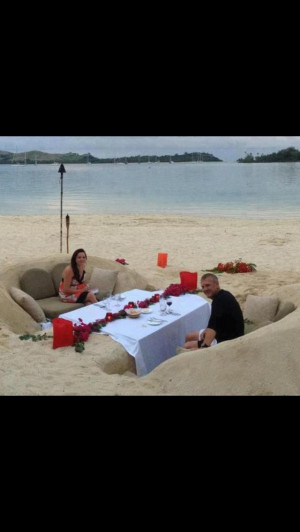 Romantic beach picnic - dig hole in sand and use ground as a table