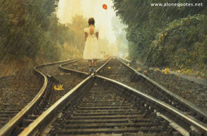 alone little girl in rain on the railway