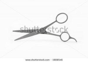 an isolated hair cutting scissors - stock photo