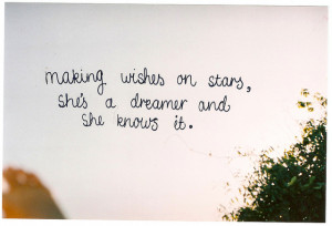 Making wishes on stars, she's a dreamer and she knows it.