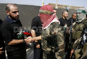 Abu Obaida , the spokesman for the Ezzedine Al-Qassam Brigades, the ...