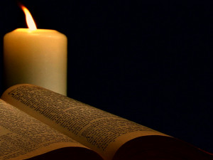 Holy Bible with Candle
