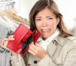 empty wallet - woman with no money shopping