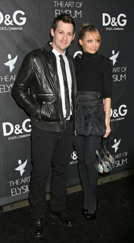 Nicole Ritchie and Joel Madden wear coordinating black outfits as they ...