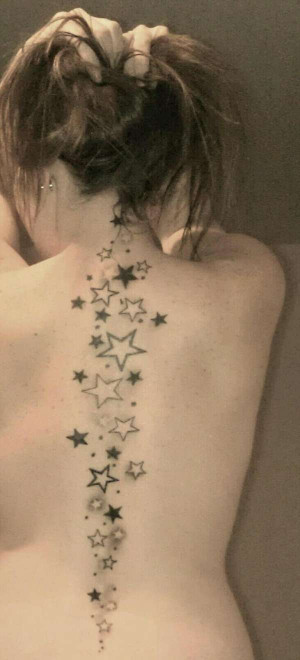 Star Tattoo down spine tattoo