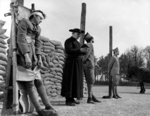 Three French soldiers prepare for execution by firing squad in Paths ...