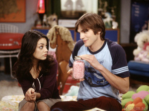 Ashotn Kutcher and Mila Kunis as Jackie and Michael onThat 70s Show
