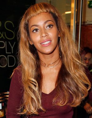 Beyoncé Debuts Super Short Bangs in Paris—Do You Think It's a Wig?
