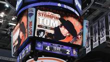 on the scoreboard to the late country singer Stompin' Tom Connors ...