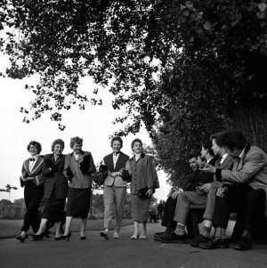 group of Teddy Boys admire the passing Teddy Girls on Clapham Common ...