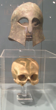 Greek Corinthian-style helmet and the skull reportedly found inside it ...