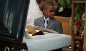 ... the funeral of his father, a victim of high gun violence in Chicago