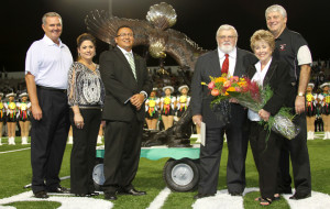 by Pasadena ISD officials, present an eagle sculpture to the school ...