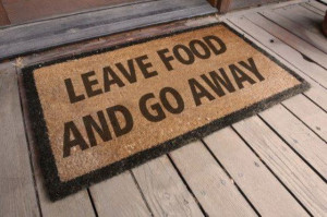 floor mat that says: “Leave food and go away