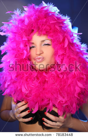 ... sexy girl in pink feathers on a blue background winks and make faces