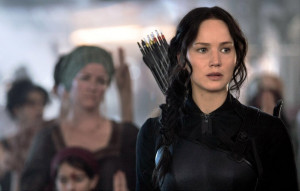 Katniss’ trademark gold-plated mockingjay pin has been exchanged for ...